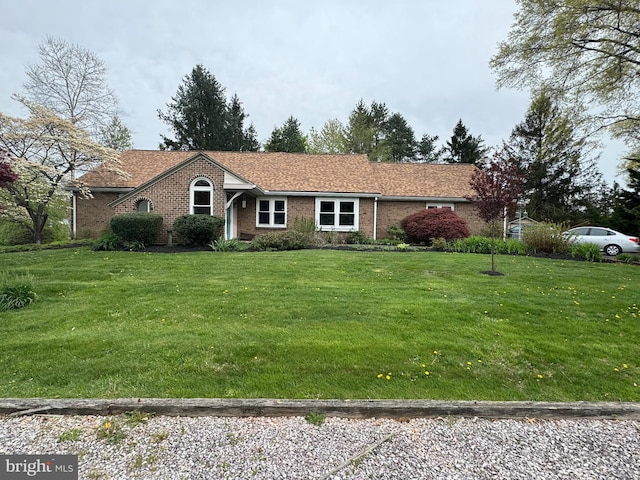 1392 Kutz Dr, Pottstown, PA 19465 - ranch-style home with brick siding and a front lawn