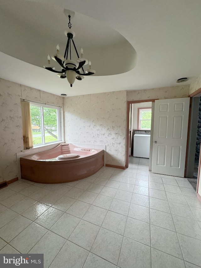 1392 Kutz Dr, Pottstown, PA 19465 - bathroom featuring tile patterned flooring, washer / clothes dryer, a chandelier, and wallpapered walls