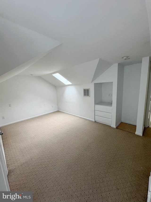 1392 Kutz Dr, Pottstown, PA 19465 - additional living space featuring carpet floors, a skylight, and lofted ceiling
