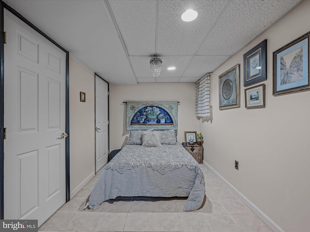 9 S Laurel Ave, Berkeley Springs, WV 25411 - bedroom with a drop ceiling, recessed lighting, tile patterned floors, and baseboards