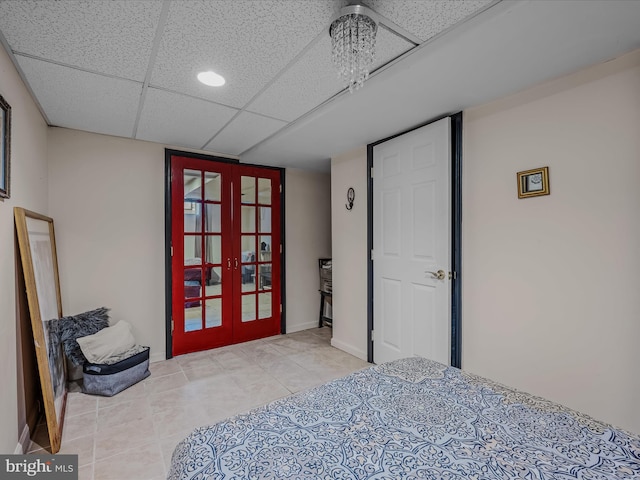 9 S Laurel Ave, Berkeley Springs, WV 25411 - bedroom featuring french doors, a paneled ceiling, tile patterned flooring, and recessed lighting