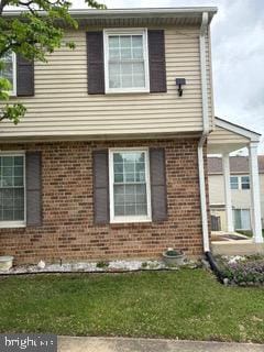 2955 Chester Grove Rd, Upper Marlboro, MD 20774 - view of front of home with brick siding and a front yard