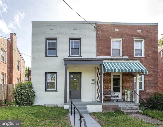 15 47th St SE, Washington, DC 20019 - view of front of house featuring brick siding and covered porch