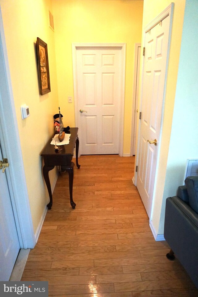 97 Burholme Dr, Hamilton, NJ 08691 - corridor featuring light wood-style floors and baseboards
