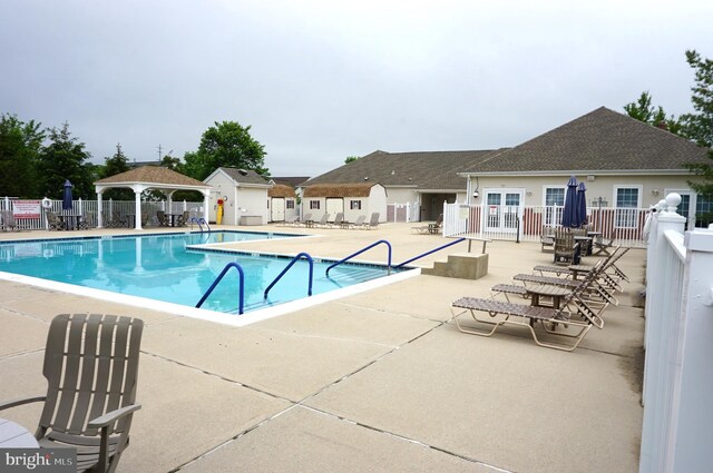 97 Burholme Dr, Hamilton, NJ 08691 - community pool featuring a gazebo, fence, and a patio area