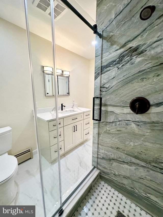 bathroom featuring a baseboard heating unit, a marble finish shower, vanity, and toilet