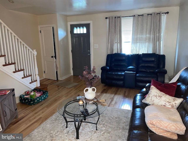 3110 Wellington St, Philadelphia, PA 19149 - living area with wood finished floors, stairway, and baseboards