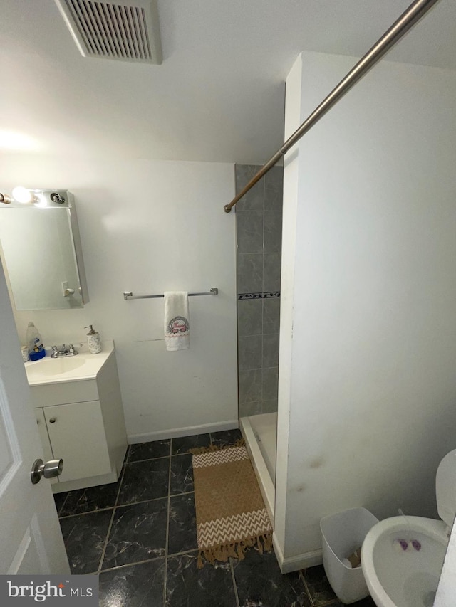 3110 Wellington St, Philadelphia, PA 19149 - full bathroom featuring a shower stall, toilet, vanity, and baseboards