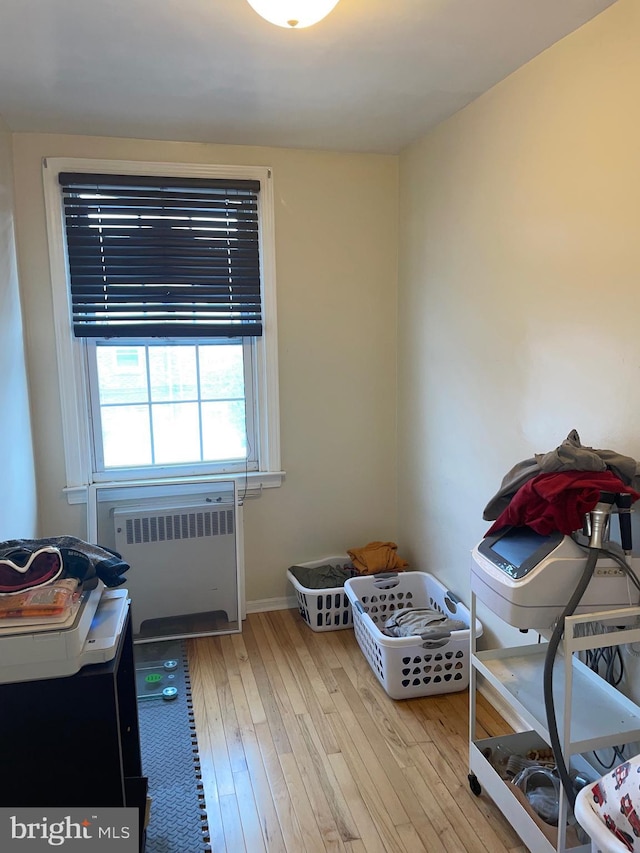 3110 Wellington St, Philadelphia, PA 19149 - miscellaneous room featuring radiator, wood-type flooring, and baseboards