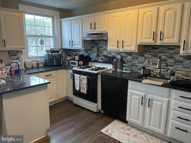 3110 Wellington St, Philadelphia, PA 19149 - kitchen featuring range with gas stovetop, dishwasher, under cabinet range hood, a sink, and dark wood-style flooring