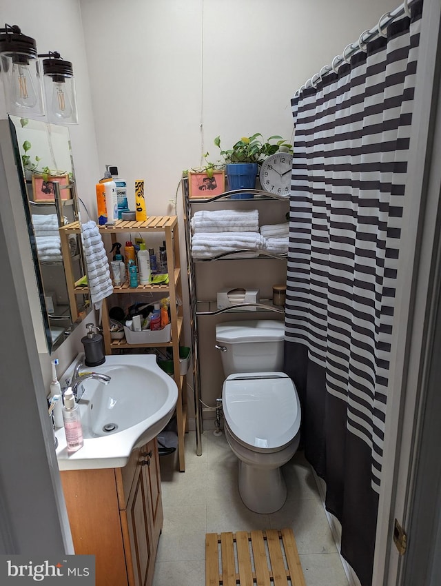 full bath with vanity and toilet