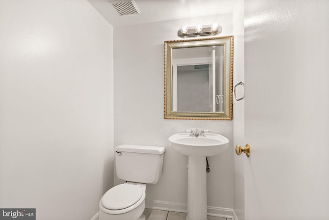 513 Tavenner Ct, Sterling, VA 20164 - bathroom featuring toilet, baseboards, and tile patterned flooring