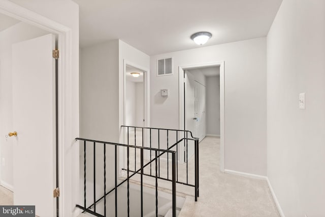 513 Tavenner Ct, Sterling, VA 20164 - hall featuring an upstairs landing, baseboards, and carpet