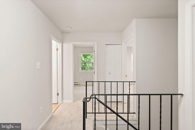 513 Tavenner Ct, Sterling, VA 20164 - hallway with carpet flooring, baseboards, an upstairs landing, and baseboard heating