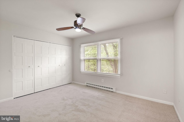 513 Tavenner Ct, Sterling, VA 20164 - unfurnished bedroom with a baseboard heating unit, carpet flooring, baseboards, a closet, and ceiling fan