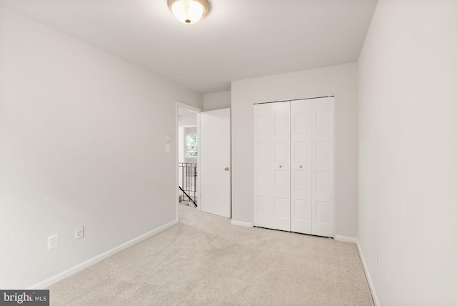 513 Tavenner Ct, Sterling, VA 20164 - unfurnished bedroom with carpet flooring, baseboards, and a closet