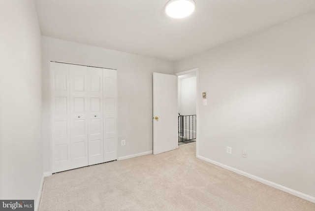 513 Tavenner Ct, Sterling, VA 20164 - unfurnished bedroom with carpet flooring, baseboards, and a closet