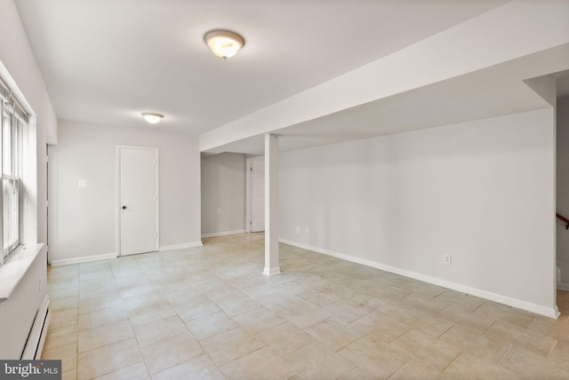 513 Tavenner Ct, Sterling, VA 20164 - basement with baseboard heating, baseboards, and light tile patterned floors
