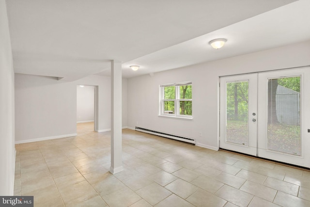 513 Tavenner Ct, Sterling, VA 20164 - spare room with a baseboard radiator, baseboards, light tile patterned floors, and french doors