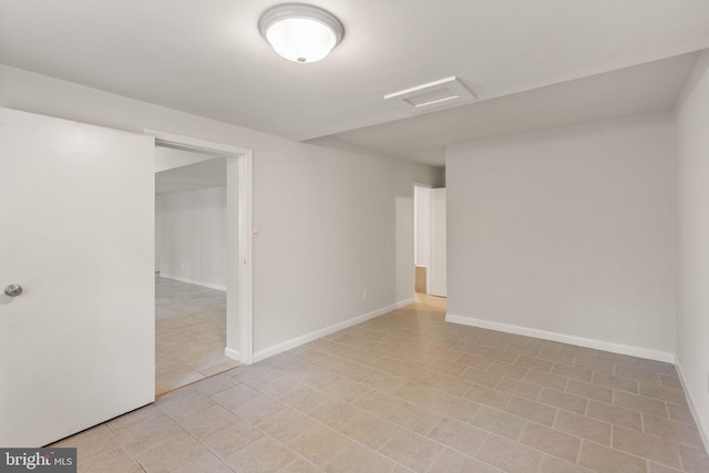 513 Tavenner Ct, Sterling, VA 20164 - unfurnished room featuring attic access, light tile patterned flooring, and baseboards