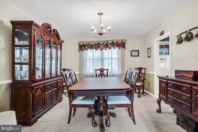 1206 Evergreen Rd, Wilmington, DE 19803 - dining space featuring light carpet, a chandelier, and baseboards