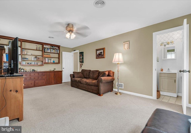 1206 Evergreen Rd, Wilmington, DE 19803 - living room with light carpet, a ceiling fan, and baseboards
