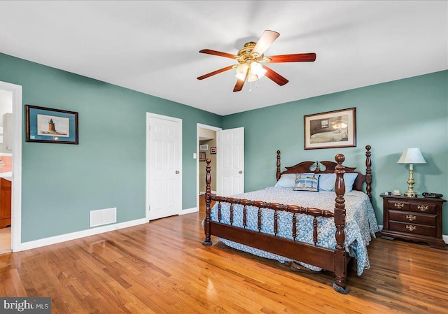 1206 Evergreen Rd, Wilmington, DE 19803 - bedroom featuring wood finished floors, baseboards, connected bathroom, and ceiling fan