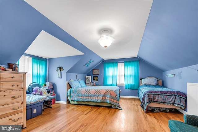 1206 Evergreen Rd, Wilmington, DE 19803 - bedroom featuring wood finished floors, vaulted ceiling, and baseboards