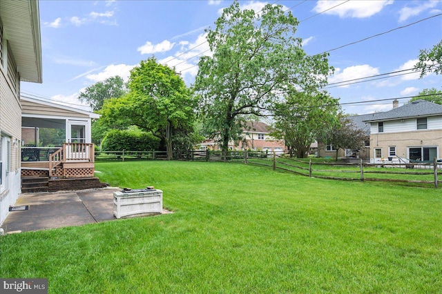1206 Evergreen Rd, Wilmington, DE 19803 - view of yard featuring a sunroom and a patio area