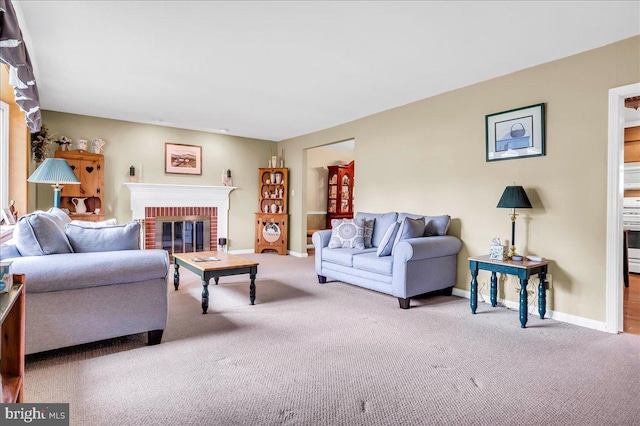1206 Evergreen Rd, Wilmington, DE 19803 - living room featuring carpet flooring, baseboards, and a fireplace