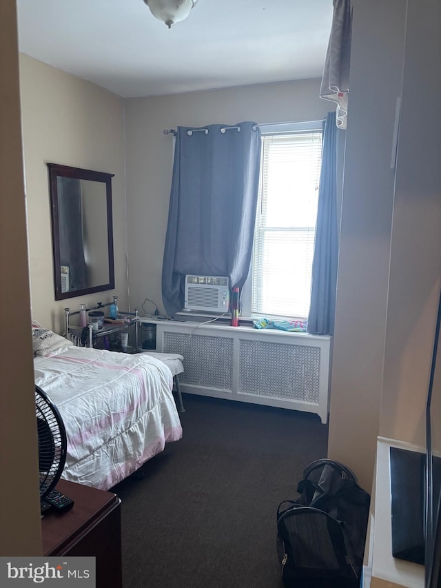 3737 N 5th St, Philadelphia, PA 19140 - bedroom with carpet floors, radiator, and cooling unit