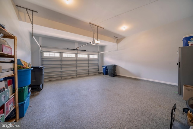 11116 Wheeler Ridge Dr, Manassas, VA 20109 - garage featuring a garage door opener and baseboards