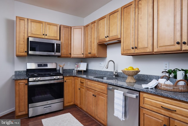 2723 Deer Ridge Dr, Silver Spring, MD 20904 - kitchen with stainless steel appliances, a sink, dark wood-style floors, and dark stone countertops