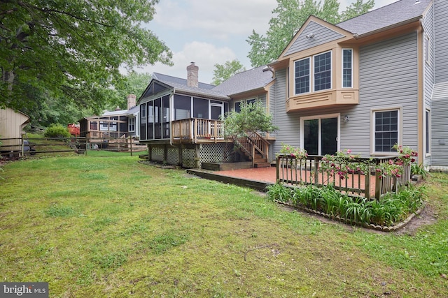2723 Deer Ridge Dr, Silver Spring, MD 20904 - back of property featuring a sunroom, a wooden deck, stairway, a chimney, and a shingled roof