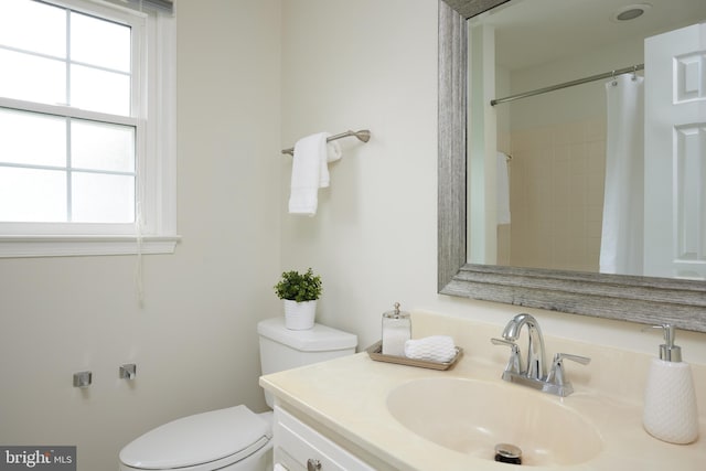 2723 Deer Ridge Dr, Silver Spring, MD 20904 - full bath with toilet, healthy amount of natural light, vanity, and curtained shower