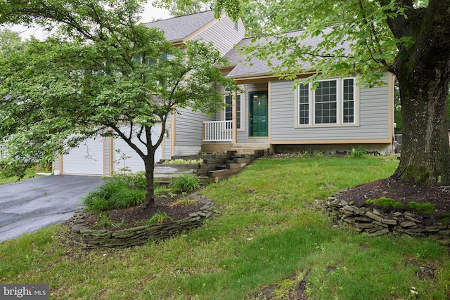 2723 Deer Ridge Dr, Silver Spring, MD 20904 - view of front of house with a shingled roof, driveway, a front lawn, and a garage