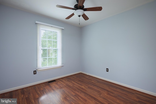 2723 Deer Ridge Dr, Silver Spring, MD 20904 - spare room with baseboards, dark wood-type flooring, and a ceiling fan