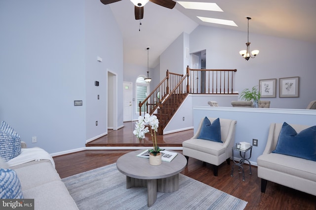 2723 Deer Ridge Dr, Silver Spring, MD 20904 - living area with stairway, wood finished floors, high vaulted ceiling, a chandelier, and baseboards