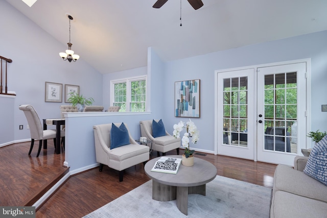 2723 Deer Ridge Dr, Silver Spring, MD 20904 - living room featuring wood finished floors, a chandelier, lofted ceiling, baseboards, and ceiling fan
