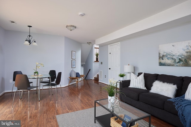 2723 Deer Ridge Dr, Silver Spring, MD 20904 - living area featuring stairs, wood finished floors, and baseboards