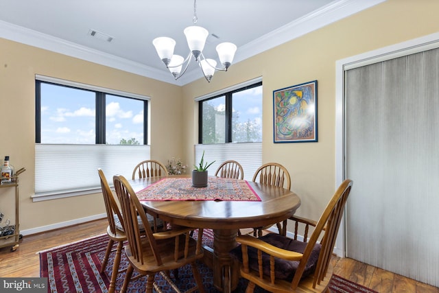 8435 Peace Lily Ct Unit 314, Lorton, VA 22079 - dining area with a chandelier, ornamental molding, wood finished floors, and baseboards