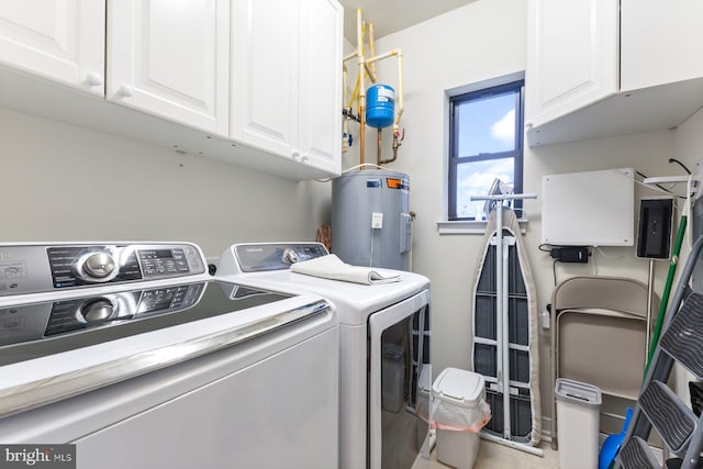 8435 Peace Lily Ct Unit 314, Lorton, VA 22079 - laundry area featuring cabinet space, washer and dryer, and electric water heater
