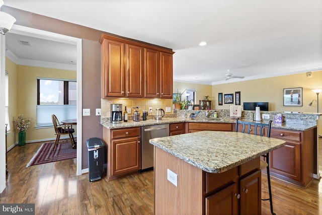 8435 Peace Lily Ct Unit 314, Lorton, VA 22079 - kitchen with dishwasher, a peninsula, crown molding, ceiling fan, and a kitchen island