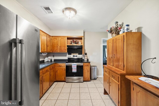 350 Poorhouse Rd, Winchester, VA 22603 - kitchen with appliances with stainless steel finishes, open shelves, dark countertops, light tile patterned floors, and brown cabinetry