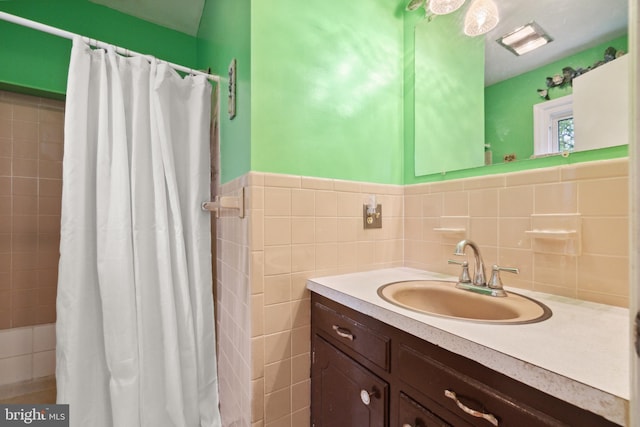350 Poorhouse Rd, Winchester, VA 22603 - full bath with vanity, a shower with curtain, and tile walls