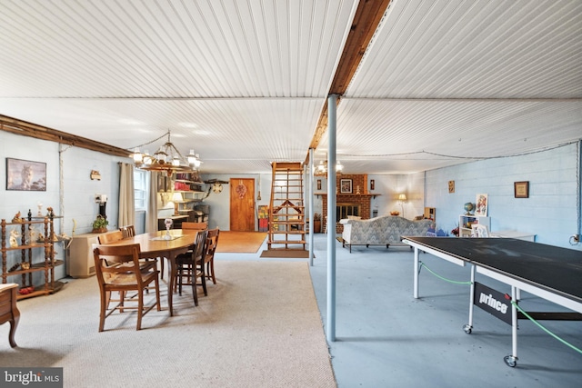 350 Poorhouse Rd, Winchester, VA 22603 - dining area with a chandelier, concrete block wall, and concrete floors