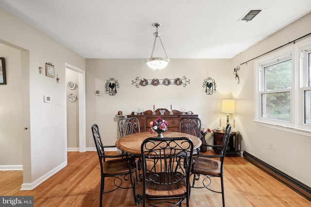 350 Poorhouse Rd, Winchester, VA 22603 - dining area featuring light wood-style flooring, a baseboard radiator, and baseboards