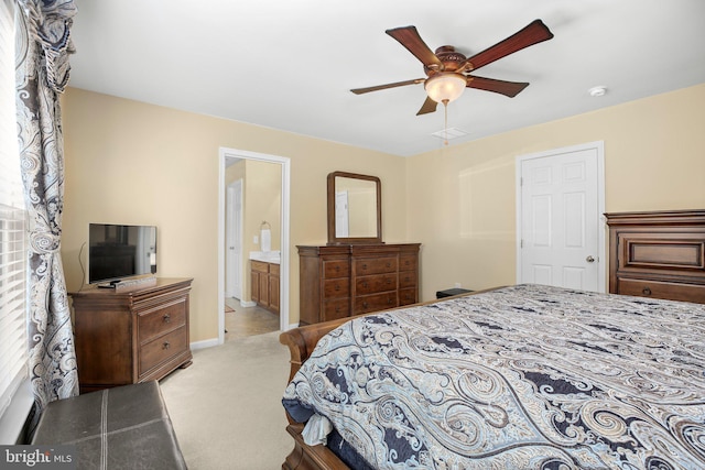 bedroom with light colored carpet, baseboards, multiple windows, and ceiling fan