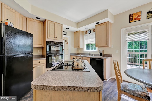7 Chattam Ct, Baltimore, MD 21234 - kitchen featuring black appliances, light brown cabinets, dark wood-style flooring, and a center island