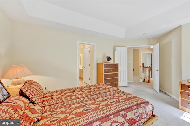 7 Chattam Ct, Baltimore, MD 21234 - bedroom featuring a raised ceiling, light carpet, baseboards, and connected bathroom